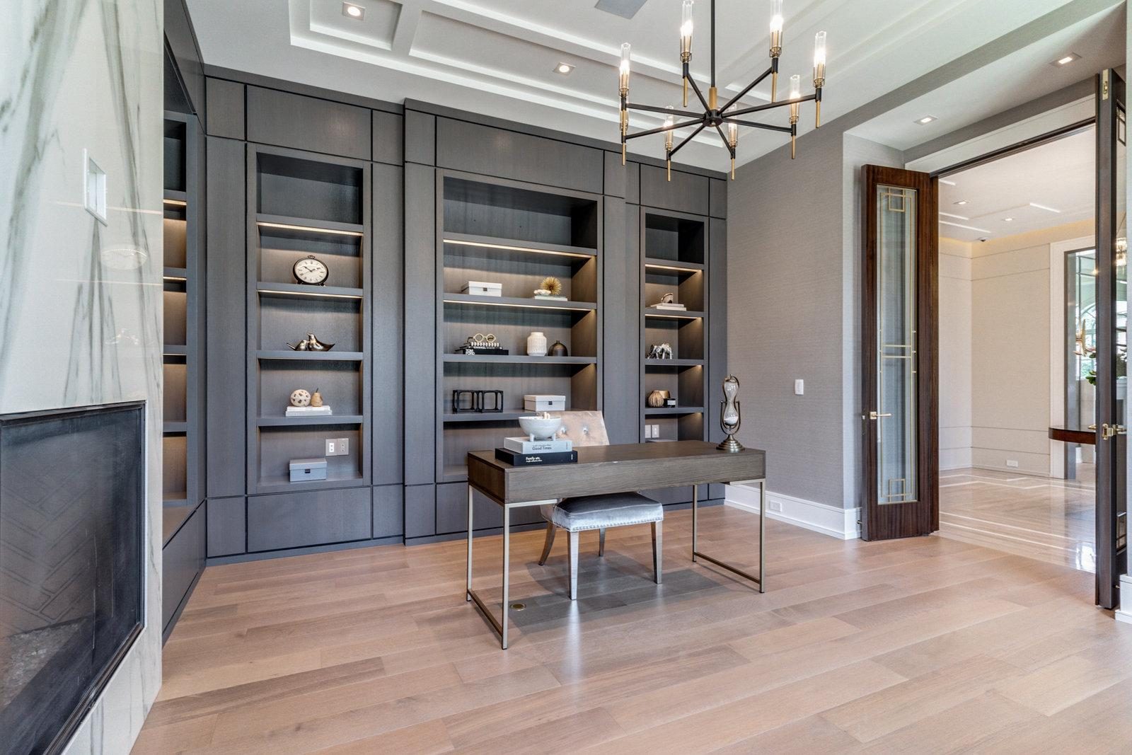 Formal dining room with bronze fireplace
