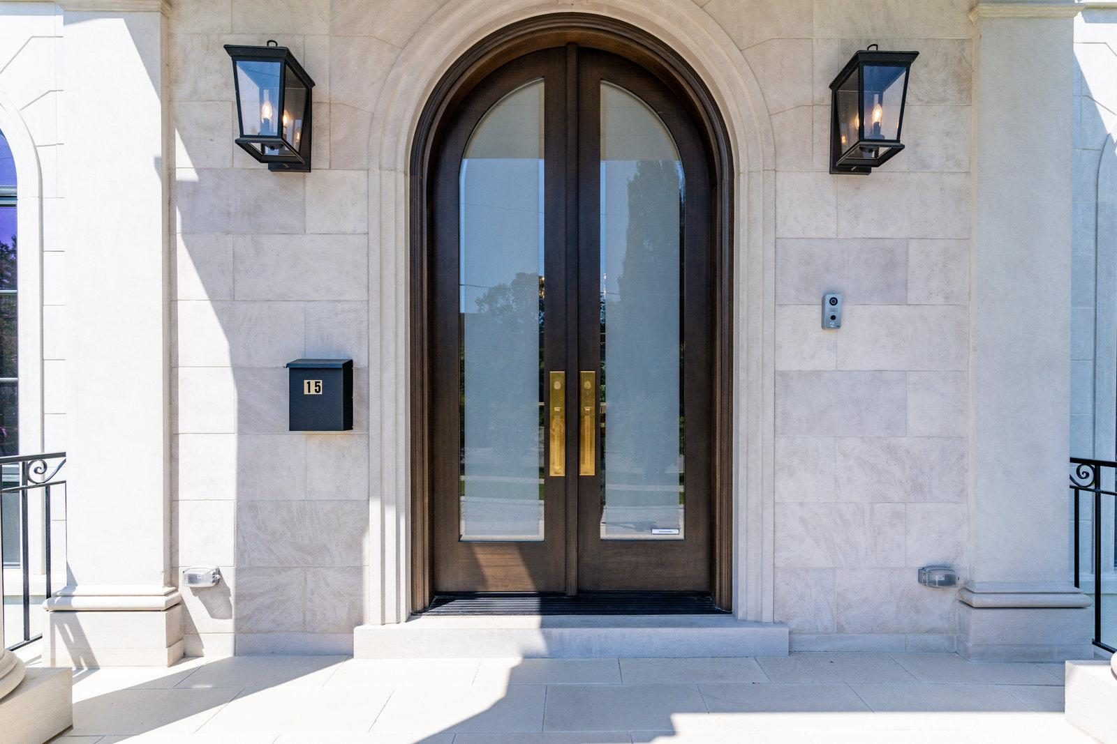 Arched wood front entry doors