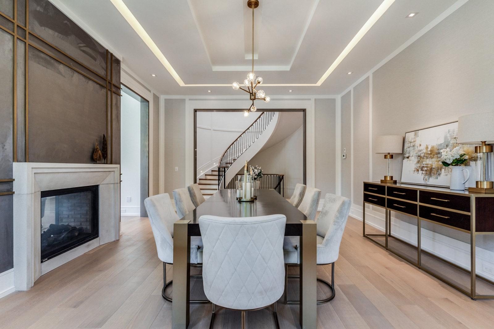 Marble waterfall kitchen with dark cabinetry