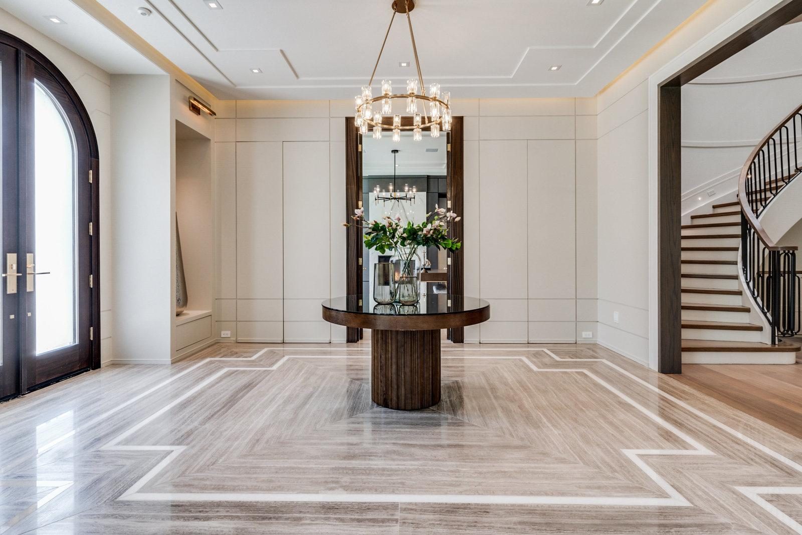 Grey panelled home office with built-ins